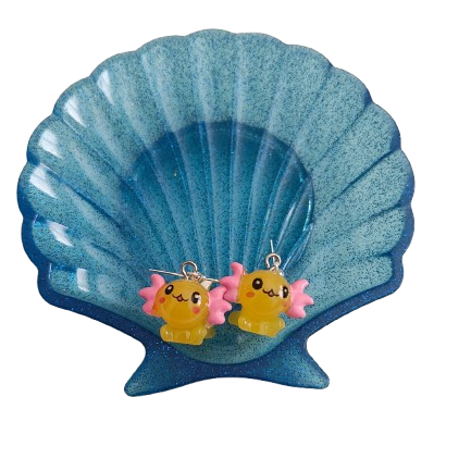 Add a touch of whimsy and charm to any outfit with our adorable Earrings featuring a Resin Axolotl on a delicate hook. These unique earrings are perfect for any animal lover and are sure to spark conversation and bring joy to your day. Stand out from the crowd and embrace your love for cute critters with these fun and stylish accessories!