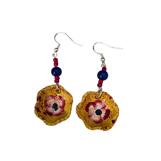 Add a taste of Mexico to your wardrobe with our Earrings! Unique ceramic plates adorned with crystal and seed beads dangle from sleek silver hooks. At 2.5 inches long and weighing only 0.13 oz, these earrings are a lightweight and stylish addition to any outfit.