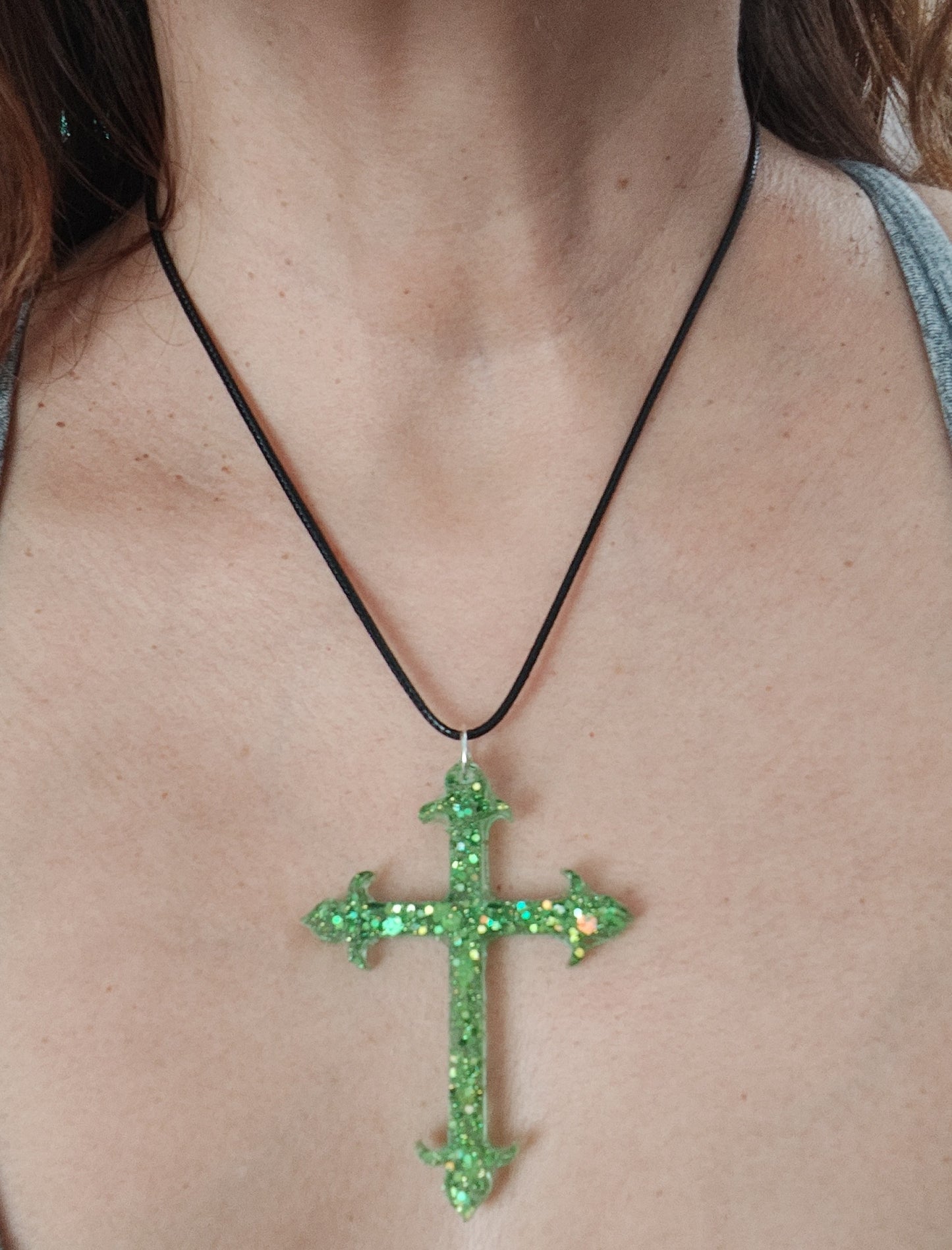 Necklace - 17.5 inches black cord with clasps with green resin cross