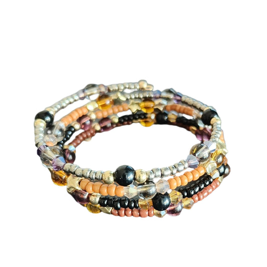 Bracelet - 4 coil Black & tan beads with  gold spacer beads memory wire bracelet