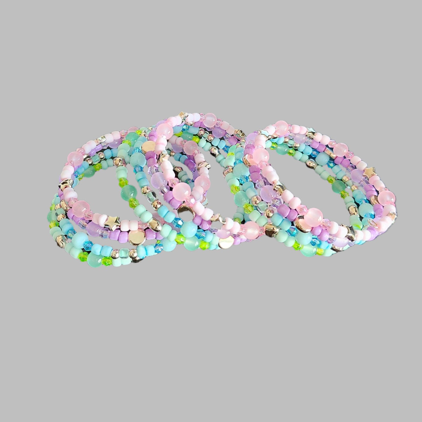 Bracelet - 4 coil Pink, purple, blue, and green beads with  rose gold spacer beads memory wire bracelet