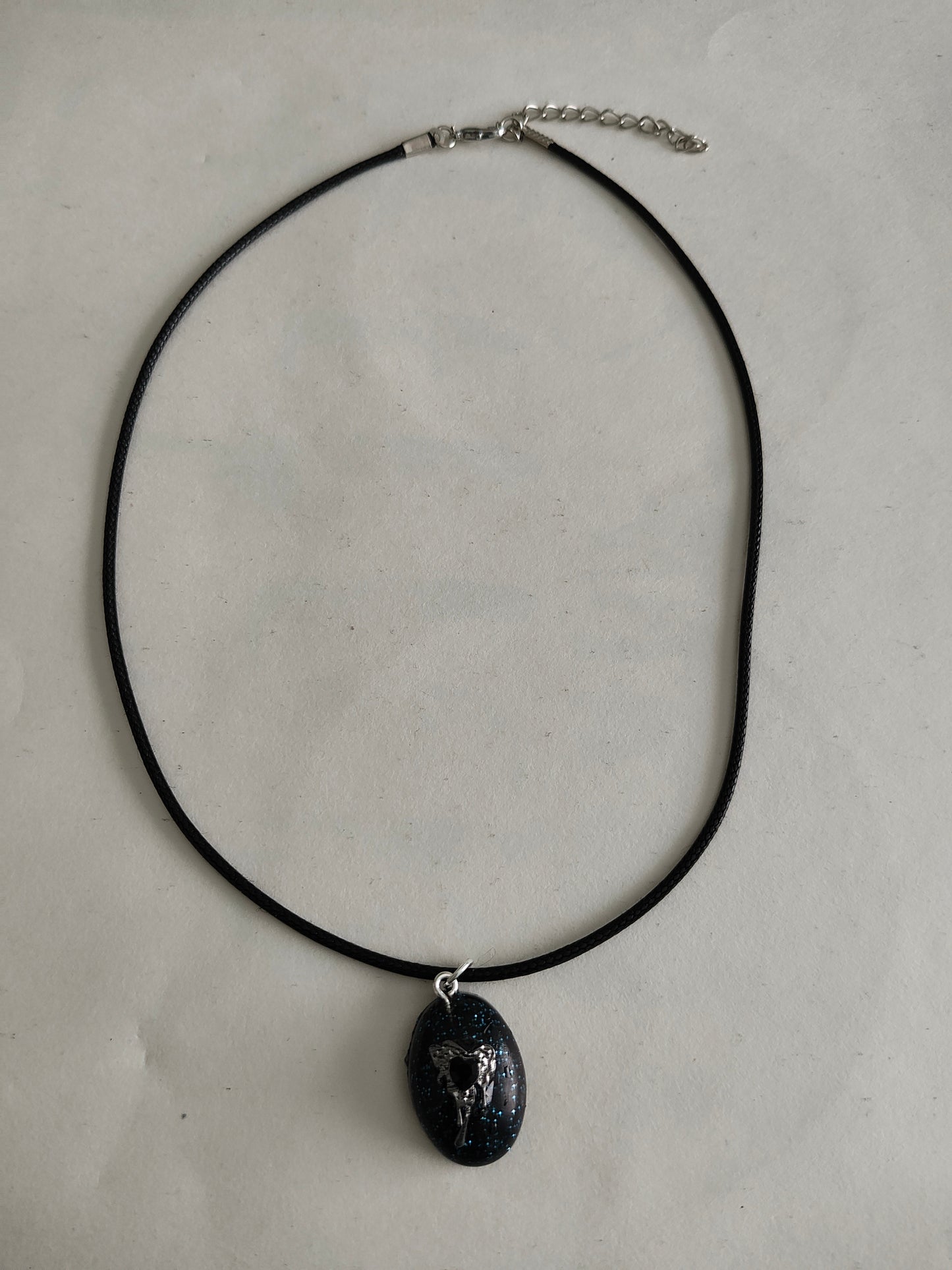 Necklace - 17.5 inches black waxed cord with resin & silver charm pendant