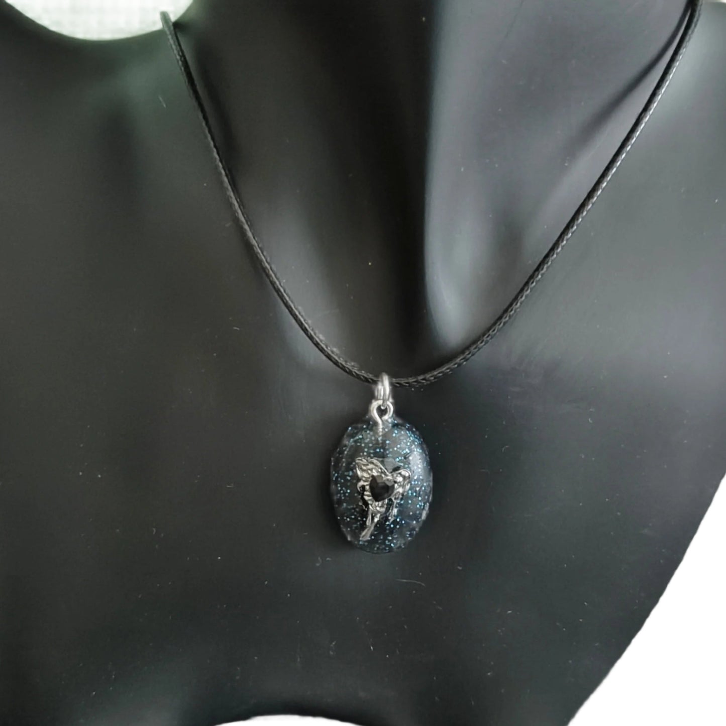 Necklace - 17.5 inches black waxed cord with resin & silver charm pendant