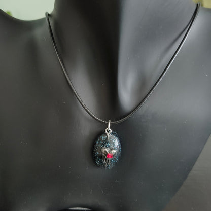 Necklace - 17.5 inches black waxed cord with resin & silver charm pendant