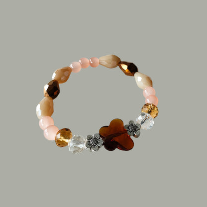 Bracelet - Elastic Crystal butterfly bead with brown, white, & pink beads and flower metal spacer beads