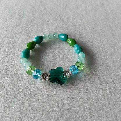 Bracelet - Elastic Crystal butterfly bead with blue and green beads and flower metal spacer beads
