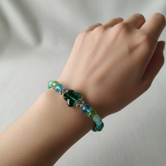 Bracelet - Elastic Crystal butterfly bead with blue and green beads and flower metal spacer beads