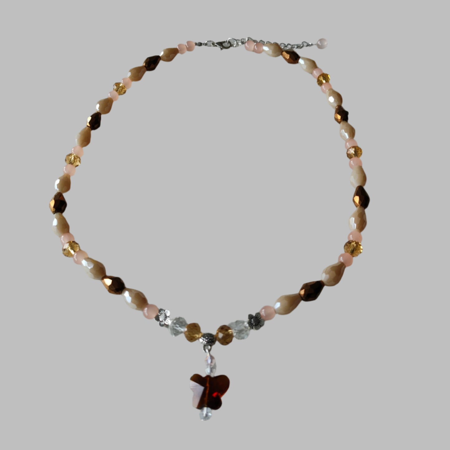 Necklace - 19.5 inches with crystal butterfly and glass beads and metal flower beads