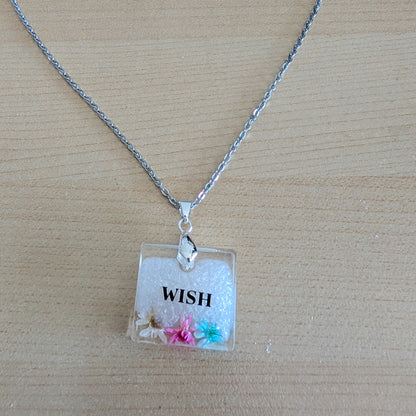 Necklace - 21 inches stainless steel cable link chain with a resin with flowers square pendant