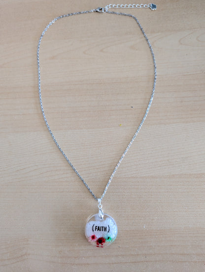 Necklace - 21 inches stainless steel cable link chain with a resin with flowers round pendant