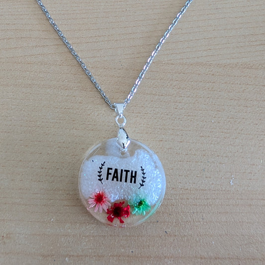 Necklace - 21 inches stainless steel cable link chain with a resin with flowers round pendant