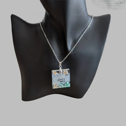 Necklace - 21 inches stainless steel cable link chain with a resin with flowers square pendant