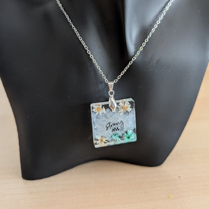 Necklace - 21 inches stainless steel cable link chain with a resin with flowers square pendant