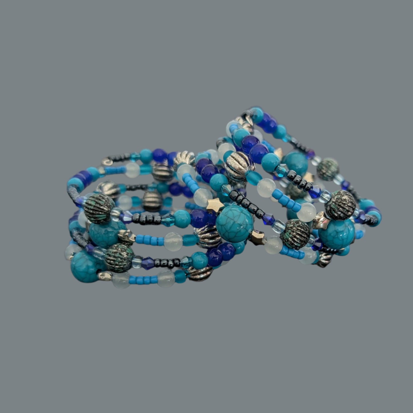 Bracelet - 4 coil Blue and silver beads on memory wire bracelet