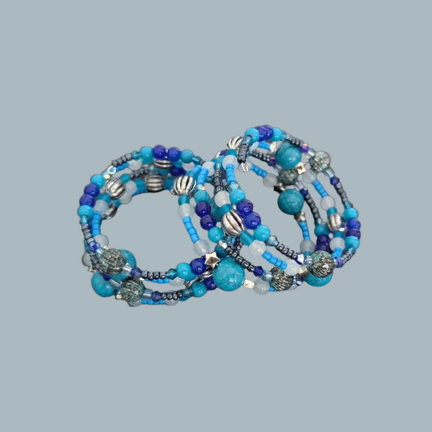 Bracelet - 4 coil Blue and silver beads on memory wire bracelet