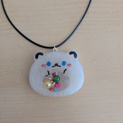 Necklace - 17.5 inches resin shaker bear on black leather cord with clasp