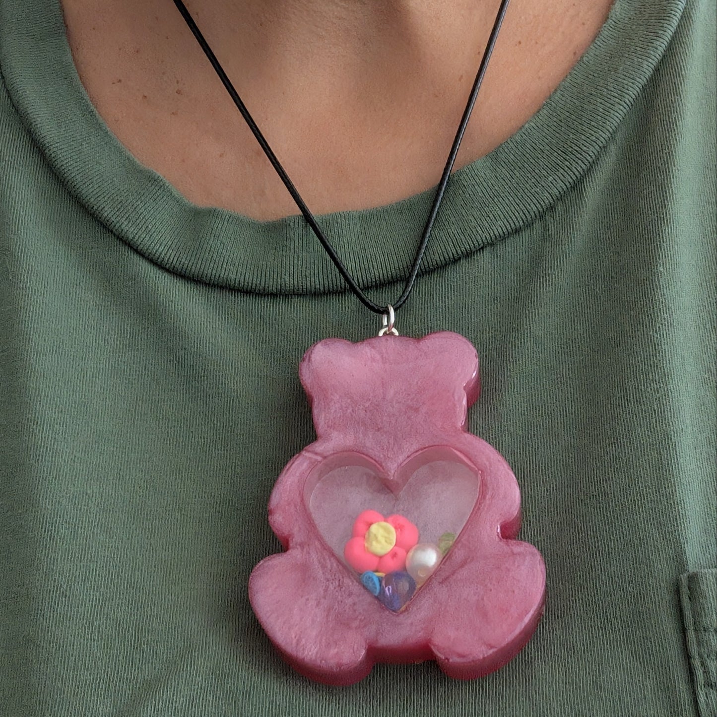 Necklace - 17.5 inches resin shaker bear on black leather cord with clasp