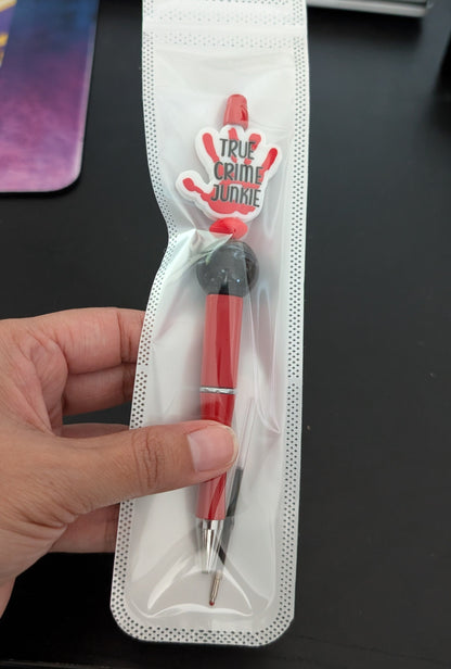Pen -True Crime Junkie Hand silicon beaded acrylic pen (black ink)