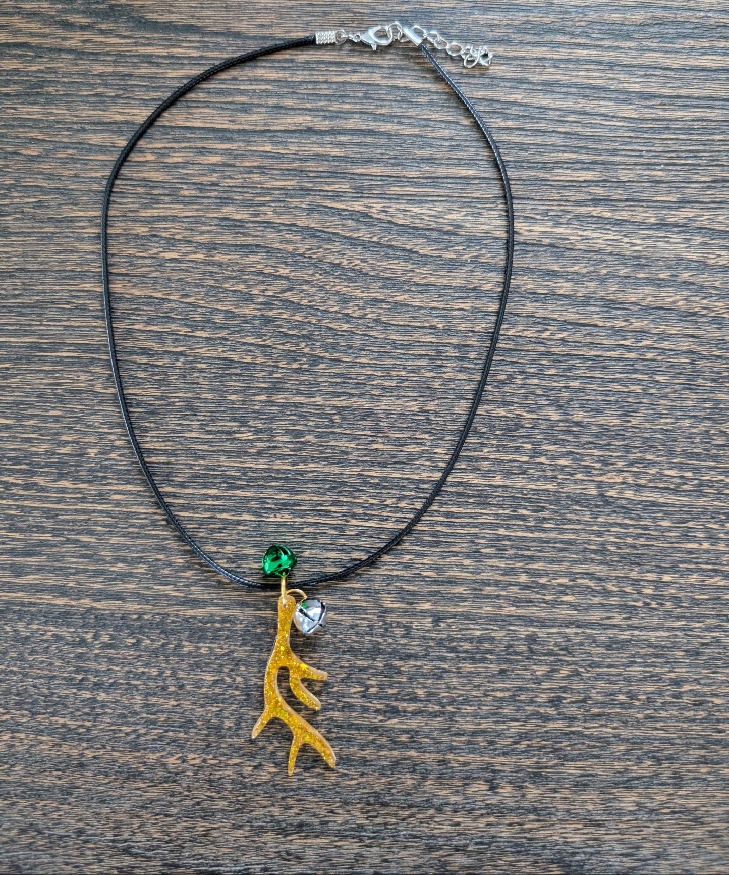 Necklace - 17.5 inches black waxed cord with resin Christmas charm and jingle bells