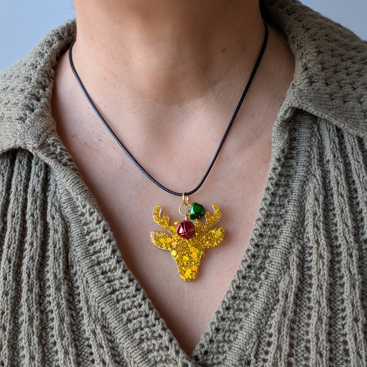 Necklace - 17.5 inches black waxed cord with resin Christmas charm and jingle bells