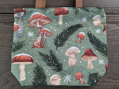 Snowy Mushrooms bag with orange lining one inner pocket and zipper closure