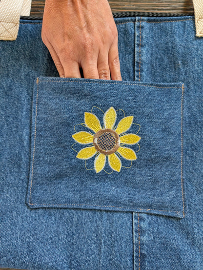 Jean tote bag with bees on green dots lining one outer pocket one inner pocket and zipper closure