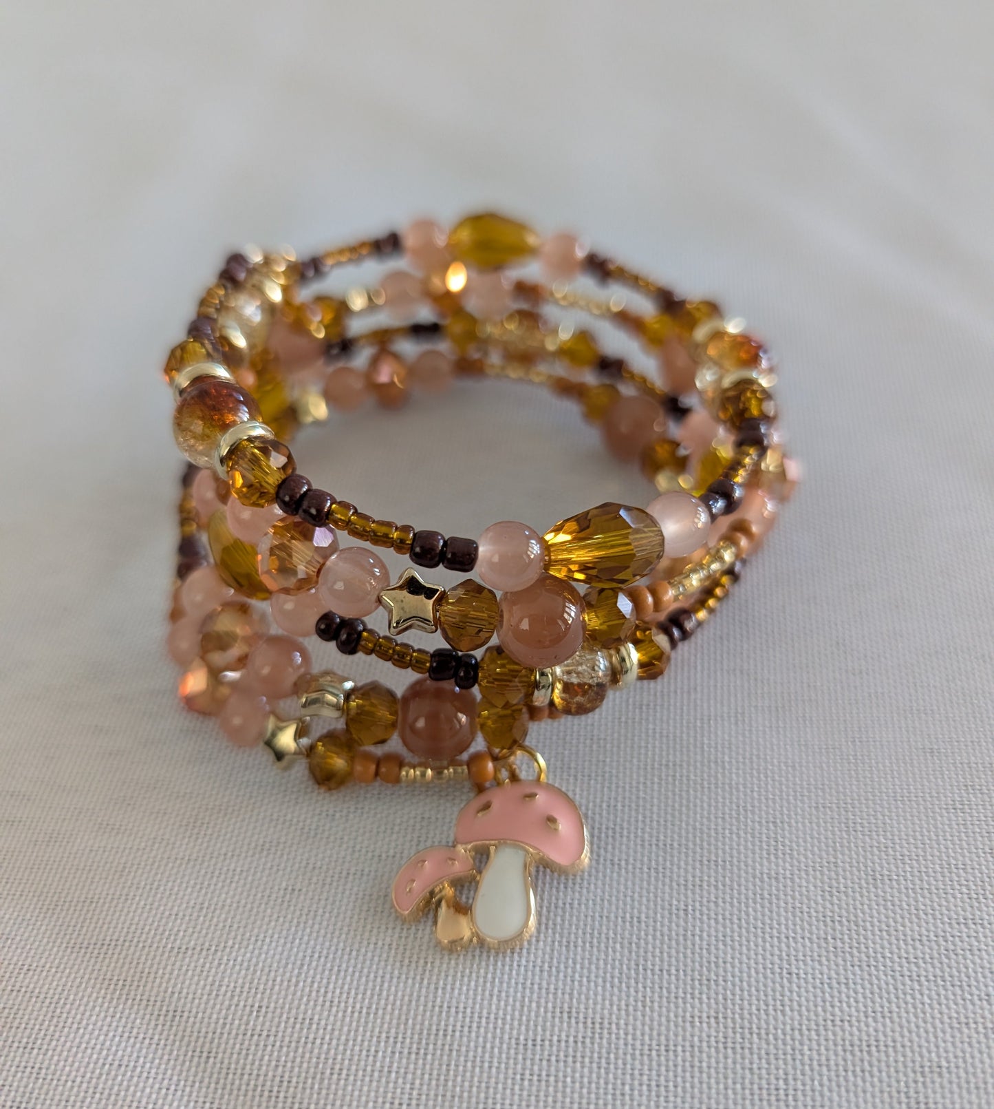 Bracelet - 4 coil Brown pink & tan memory wire bracelet with pink mushroom charm