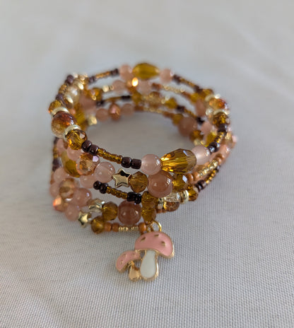 Bracelet - 4 coil Brown pink & tan memory wire bracelet with pink mushroom charm