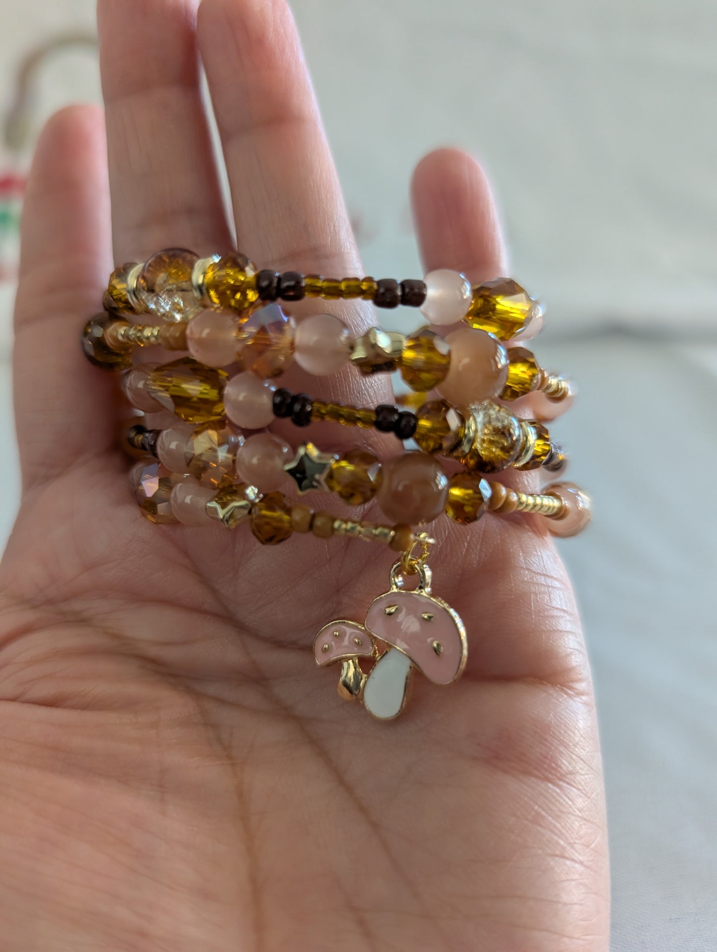 Bracelet - 4 coil Brown pink & tan memory wire bracelet with pink mushroom charm