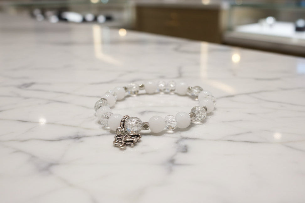 Bracelet - Elastic white & clear beads with elephant charm