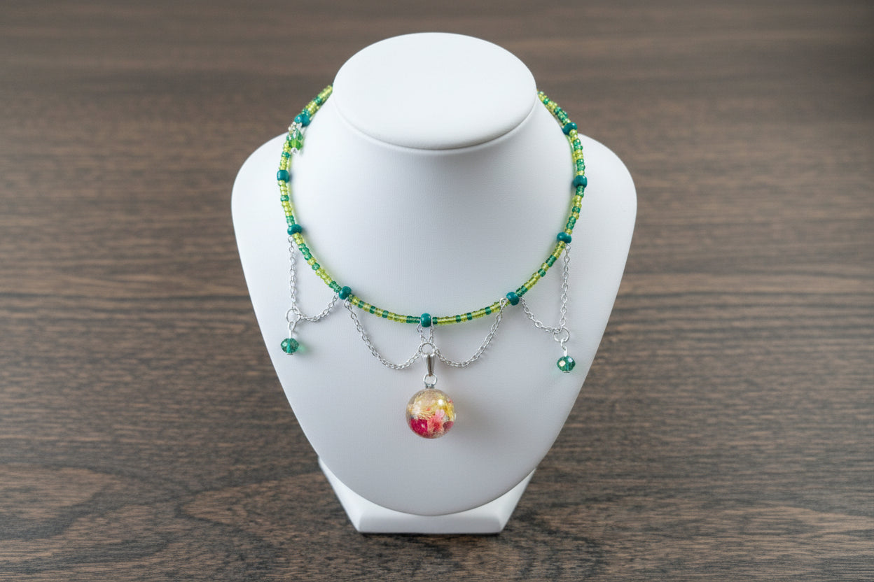 Necklace with colorful beads on a white mannequin bust against a wooden background