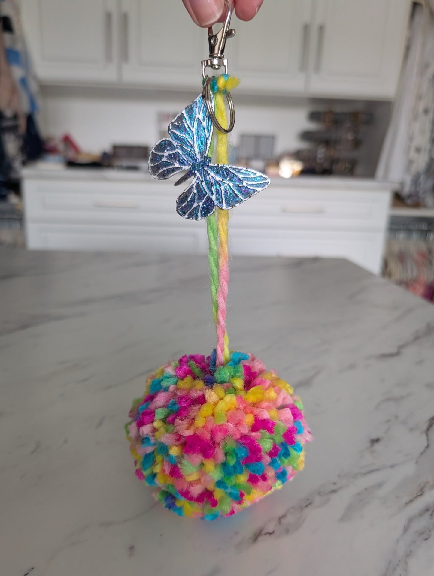 XL Colorful Pom-Pom Charm with Glitter Resin Butterfly Accent