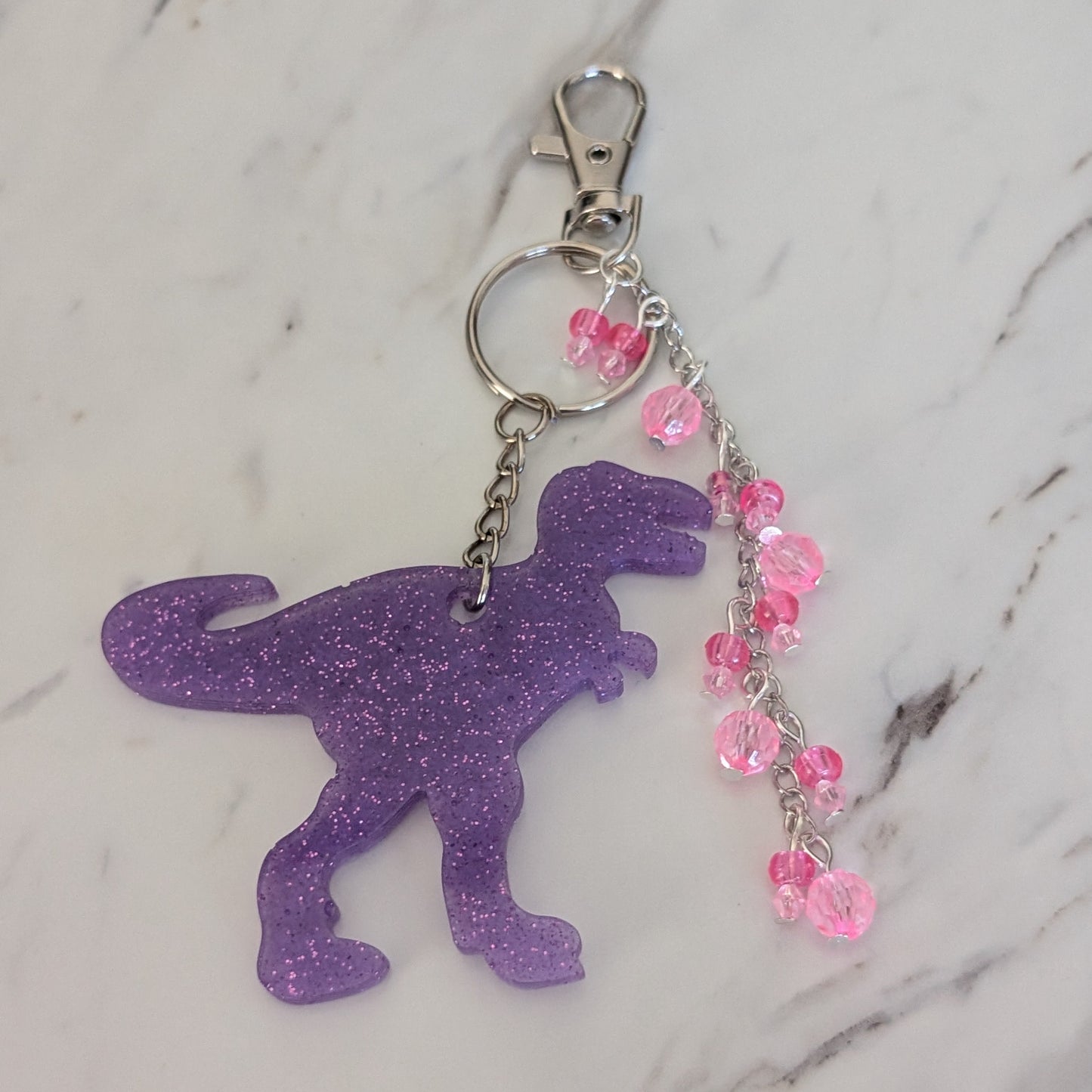 T-Rex Bag Charm – Handmade Resin Dinosaur Keychain with Beaded Tassel