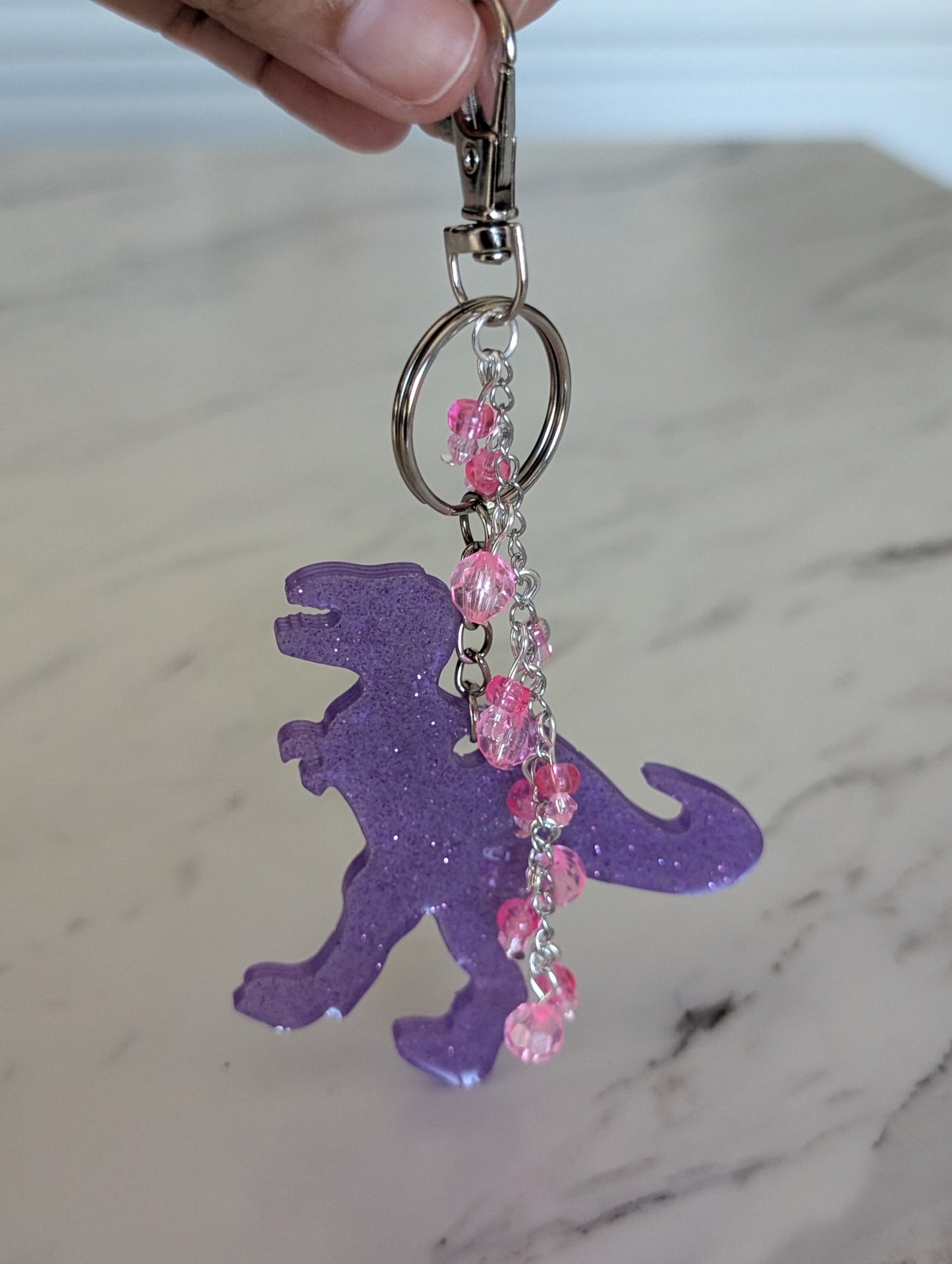 T-Rex Bag Charm – Handmade Resin Dinosaur Keychain with Beaded Tassel