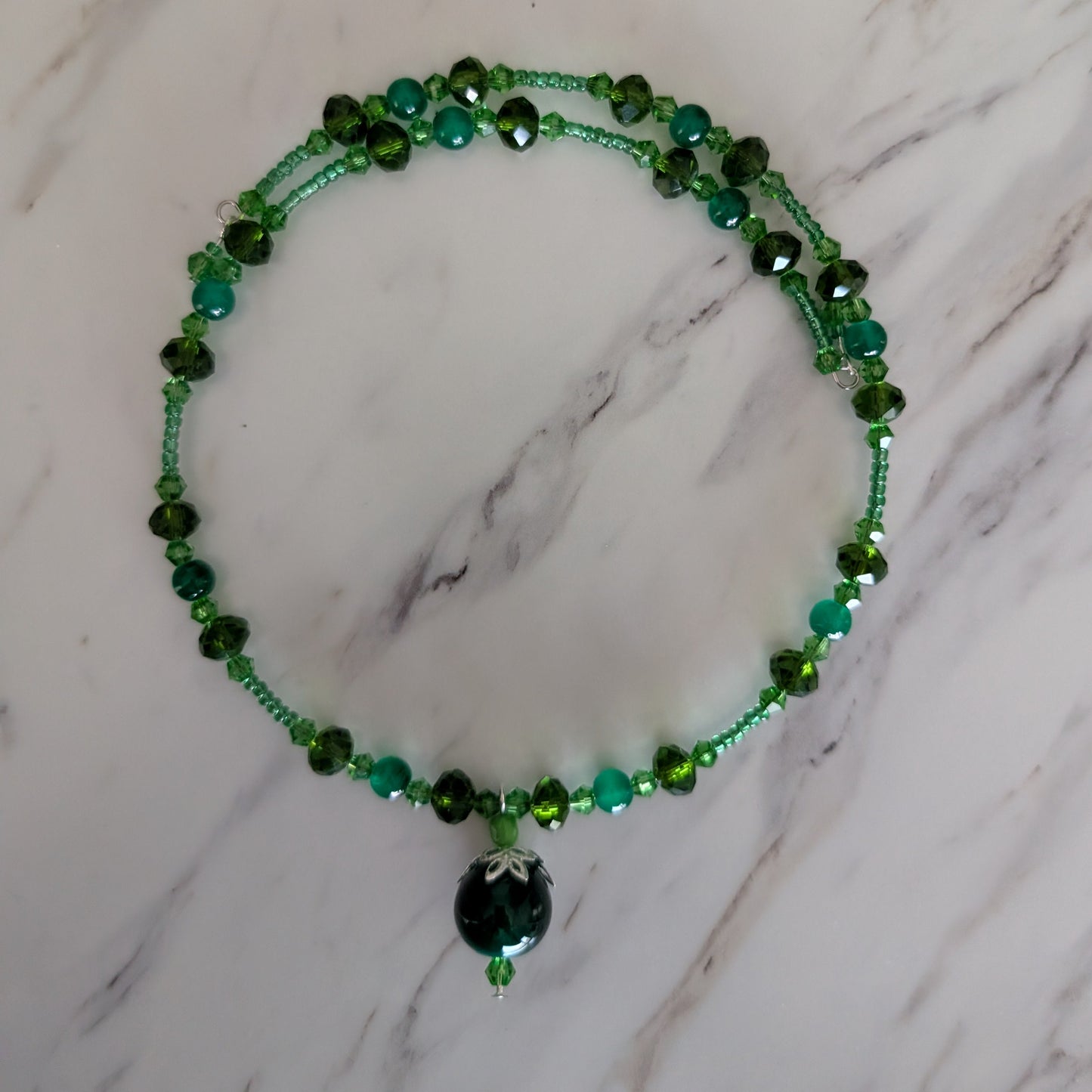 Emerald Green Beaded Memory Wire Choker with Intricate Silver-Capped Pendant