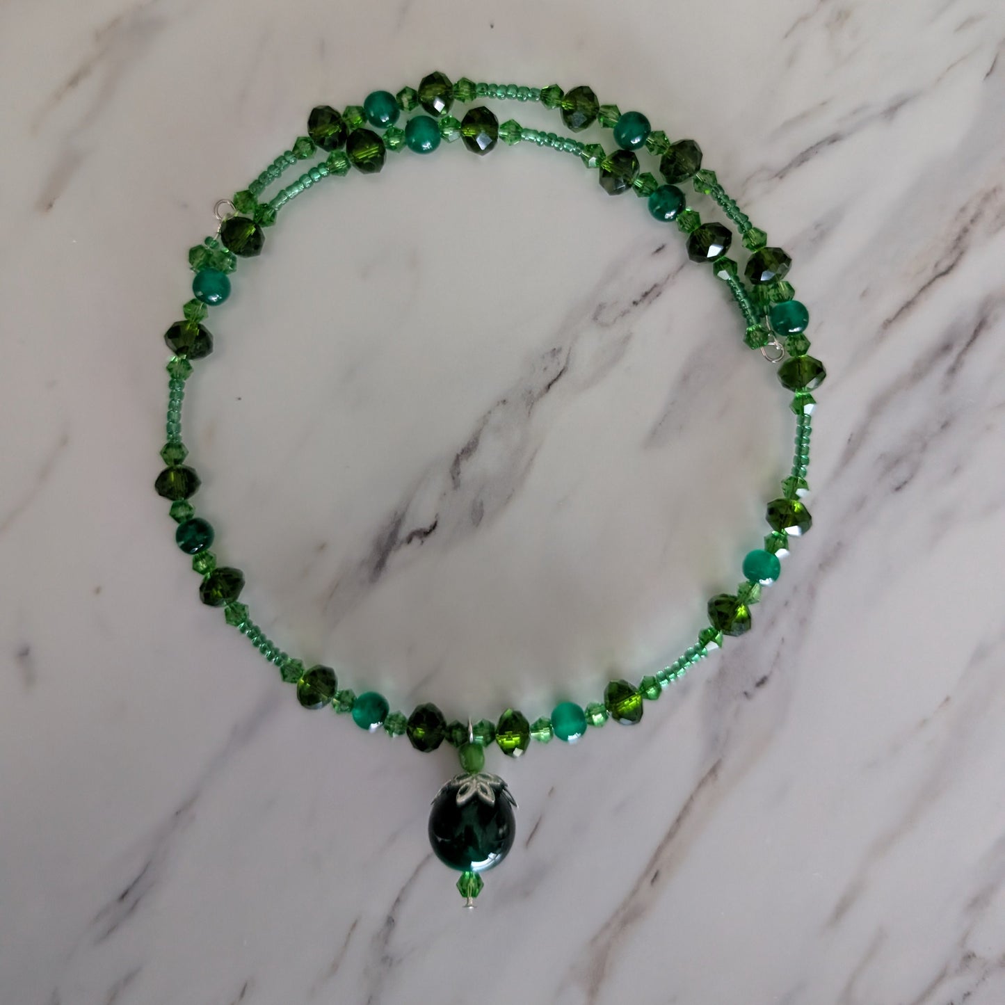 Emerald Green Beaded Memory Wire Choker with Intricate Silver-Capped Pendant