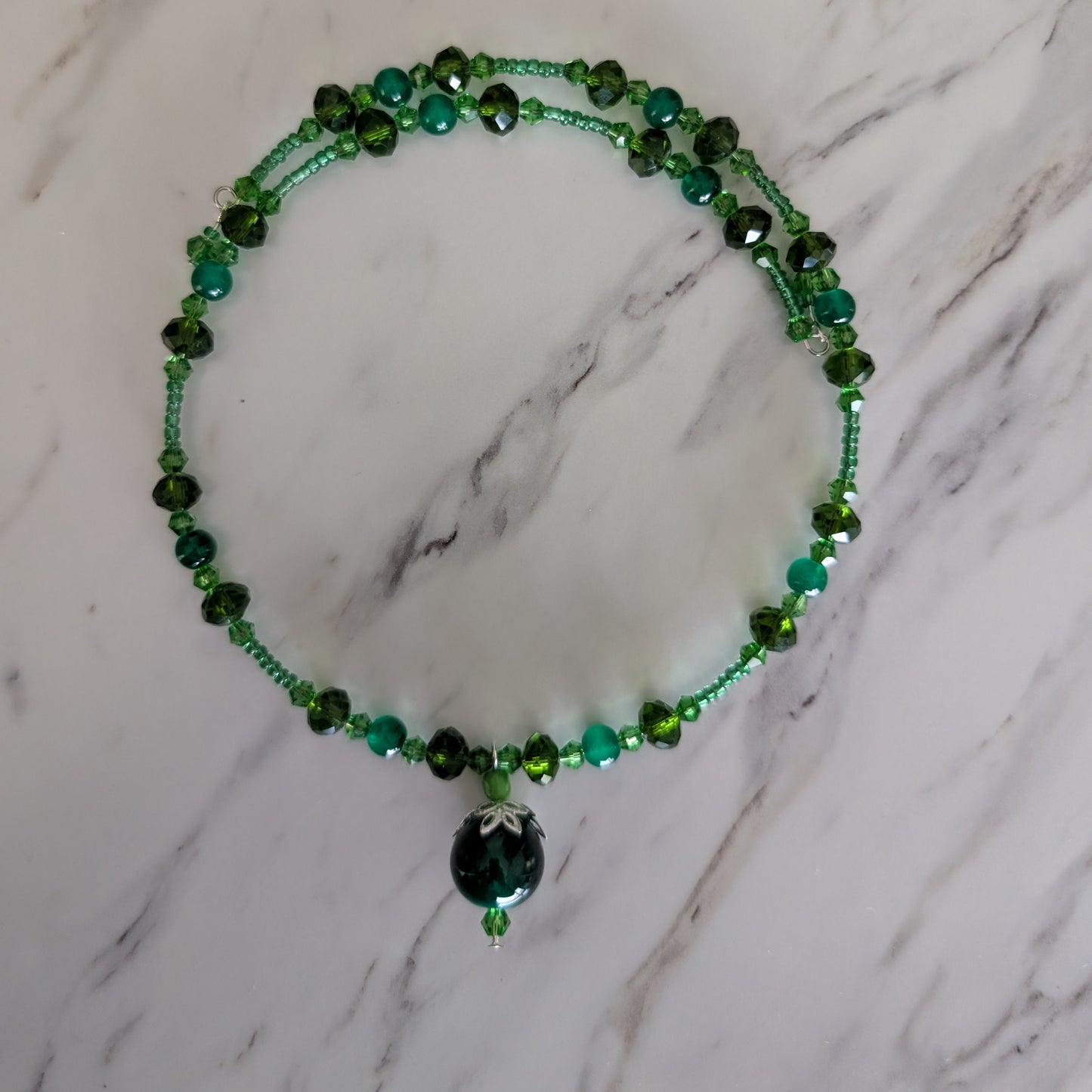 Emerald Green Beaded Memory Wire Choker with Intricate Silver-Capped Pendant