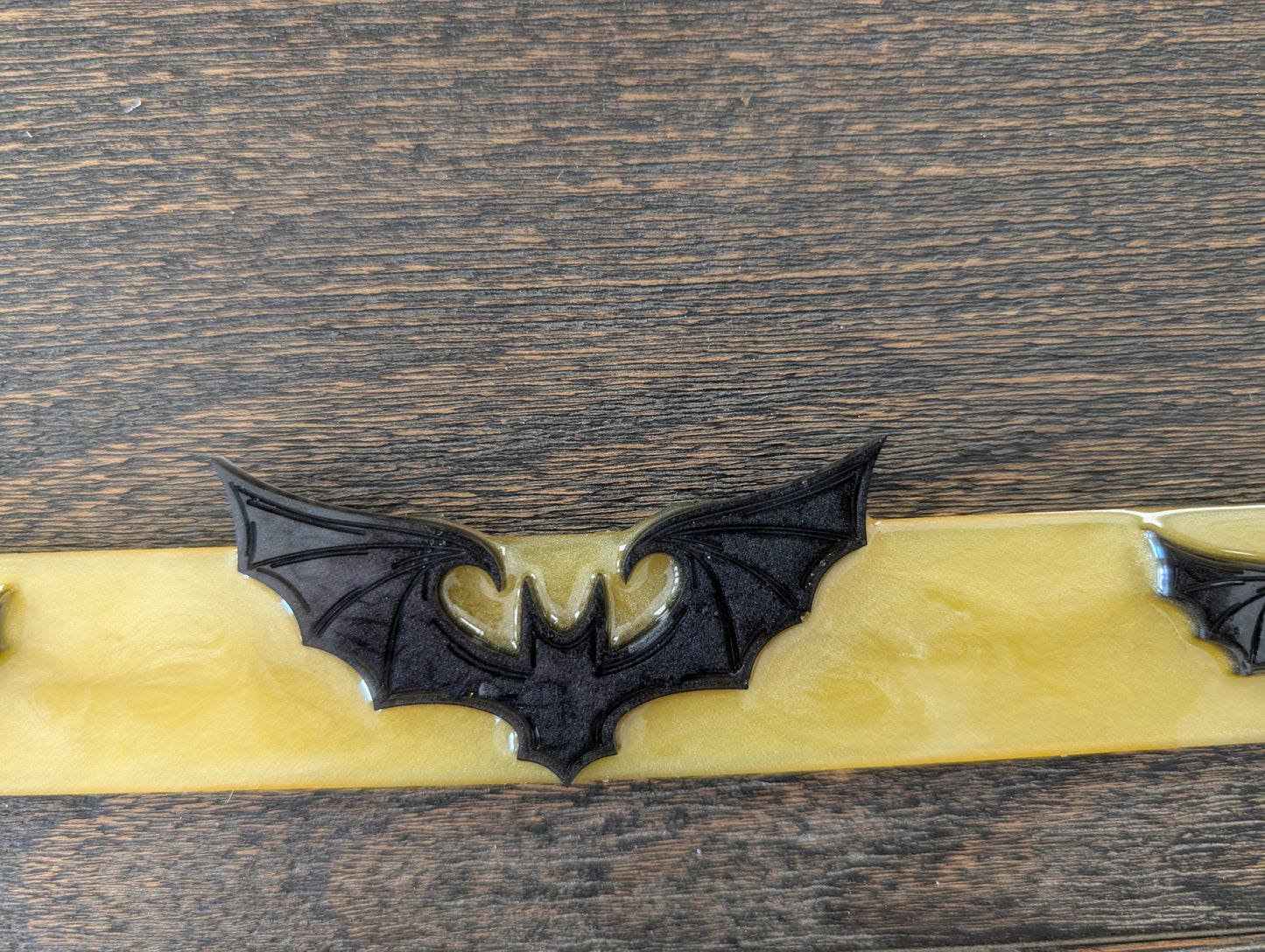 Handcrafted Resin Bat License Plate Holder – Swirly Yellow & Matte Black