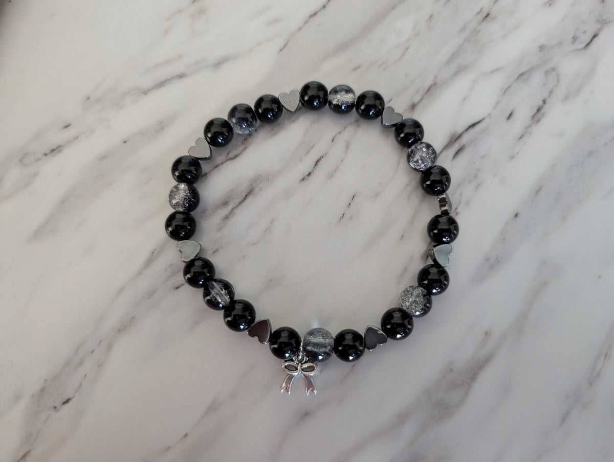 Black Crackle Glass Bead Stretch Bracelet with Silver Heart Accents & Bow Charm - Gothic Coquette Beaded Jewelry