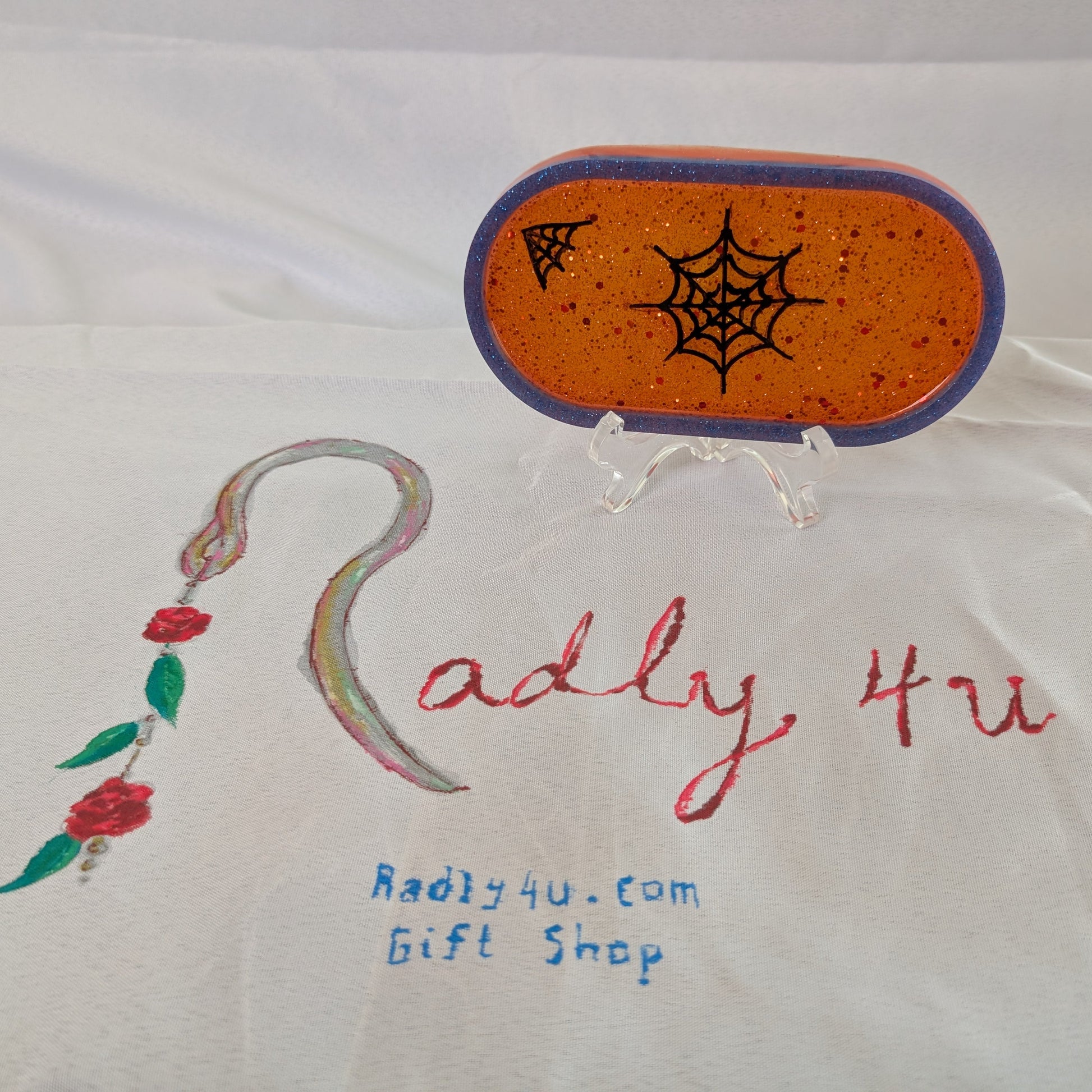 This Knickknack trinket dish not only adds a fun touch to any space with its super hero theme, but also serves as a functional and stylish storage option for small items. Made of durable resin, it is designed to keep jewelry, change, and other trinkets organized and easily accessible.