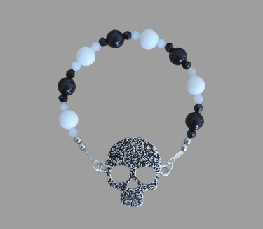 Bracelet - Elastic black & white glass beads and bicone beads with silver skeleton face charm