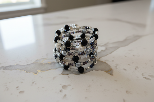 Bracelet - 6 coil black & silver glass beads with  white pearl beads and clear, purple, black bicone beads with silver spacer beads memory wire bracelet