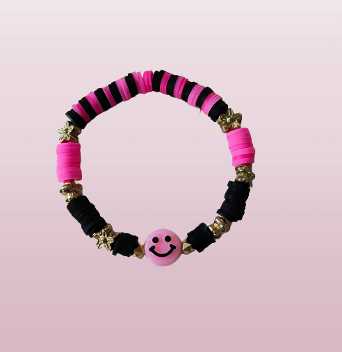 Bracelet - Elastic pink & black clay beads and gold spacer beads and a happy face acrylic bead