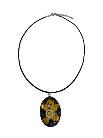 Necklace - 17.5 inches black waxed cord with resin care bear pendant