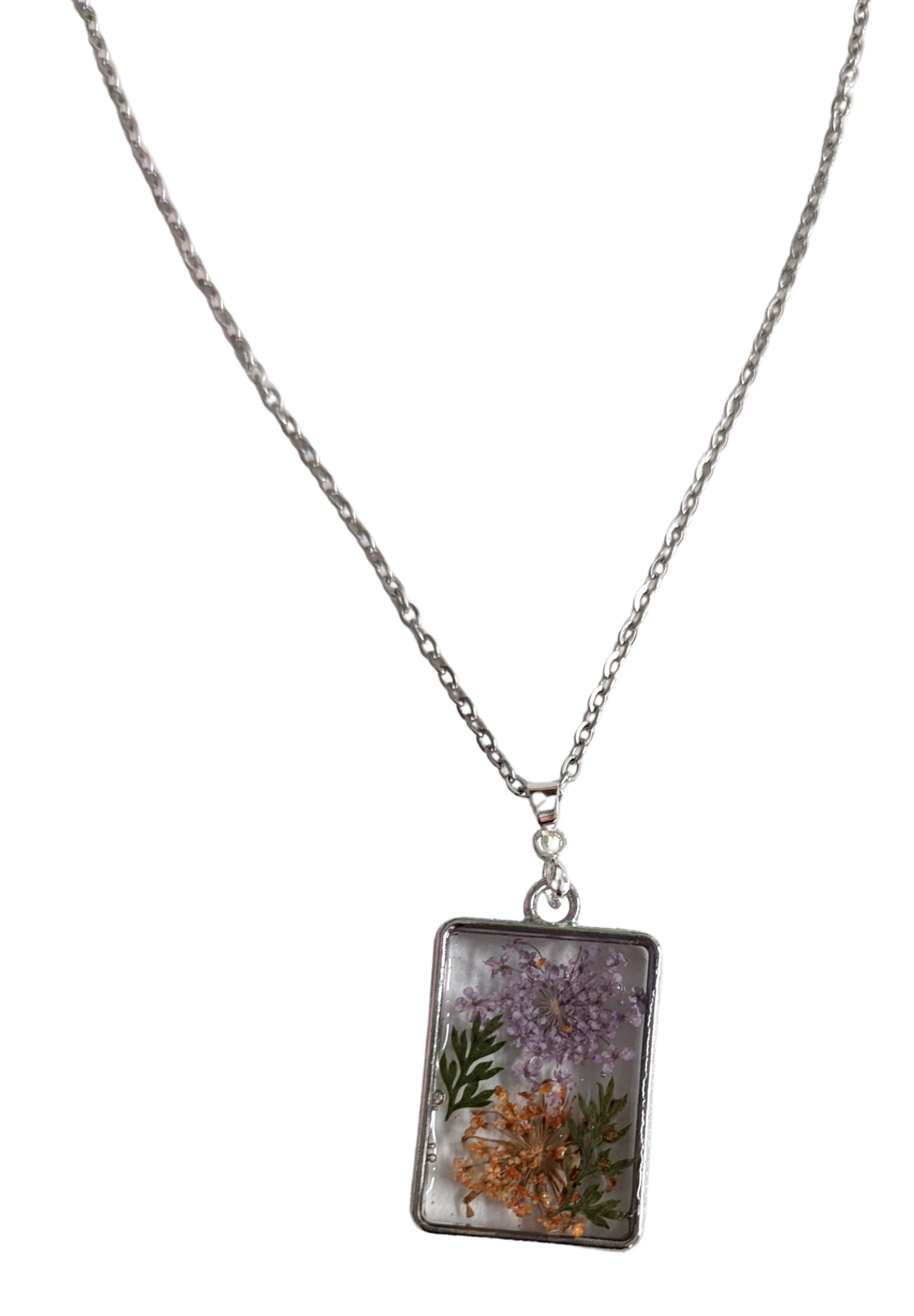 Necklace - 16.5 inches stainless steel cable link chain with a resin and flowers silver pendant