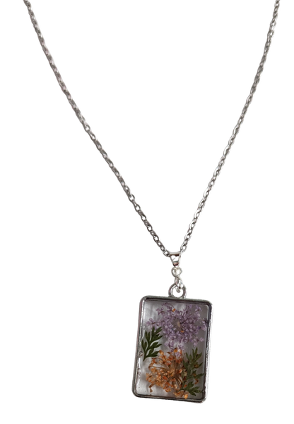 Necklace - 16.5 inches stainless steel cable link chain with a resin and flowers silver pendant