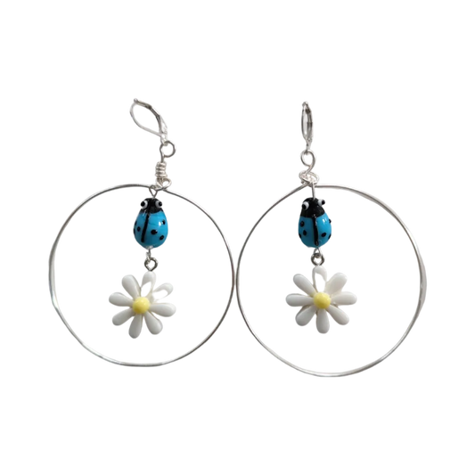 Earrings - Glass lady bug with Paris daisy flower and wire circle on lever back hoop earring