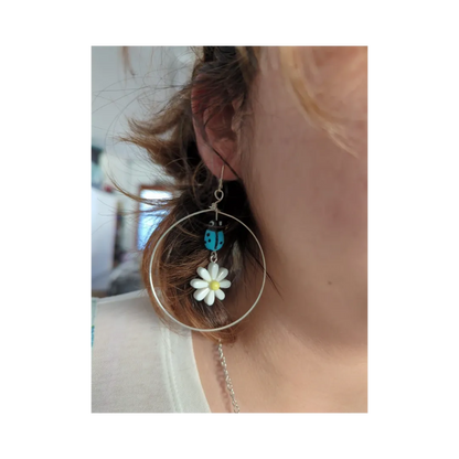 Earrings - Glass lady bug with Paris daisy flower and wire circle on lever back hoop earring