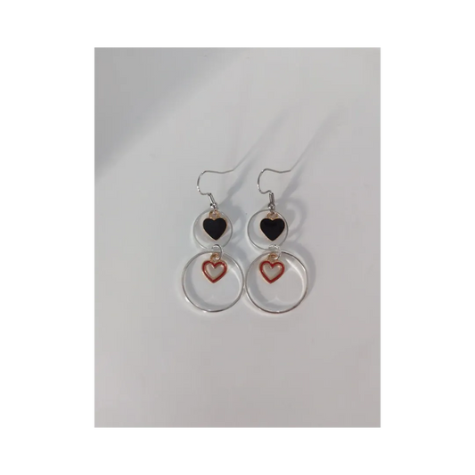 Earrings - One 1 inch silver circle and One 1/2 inch silver circle with 1 solid gold plated heart and 1 hollow gold plated heart on silver hook