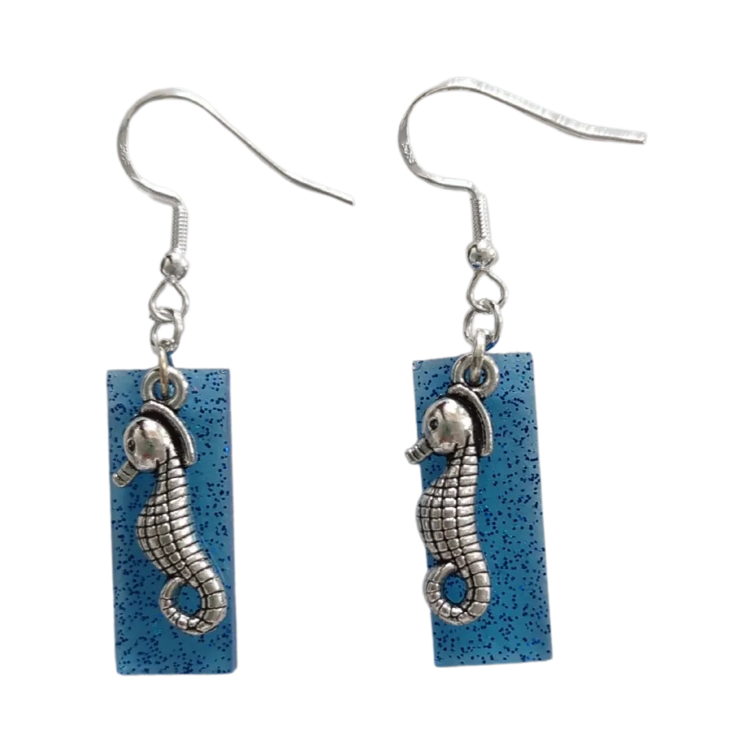 Earrings - Resin blue glitter rectangle with silver seahorse charm on hook